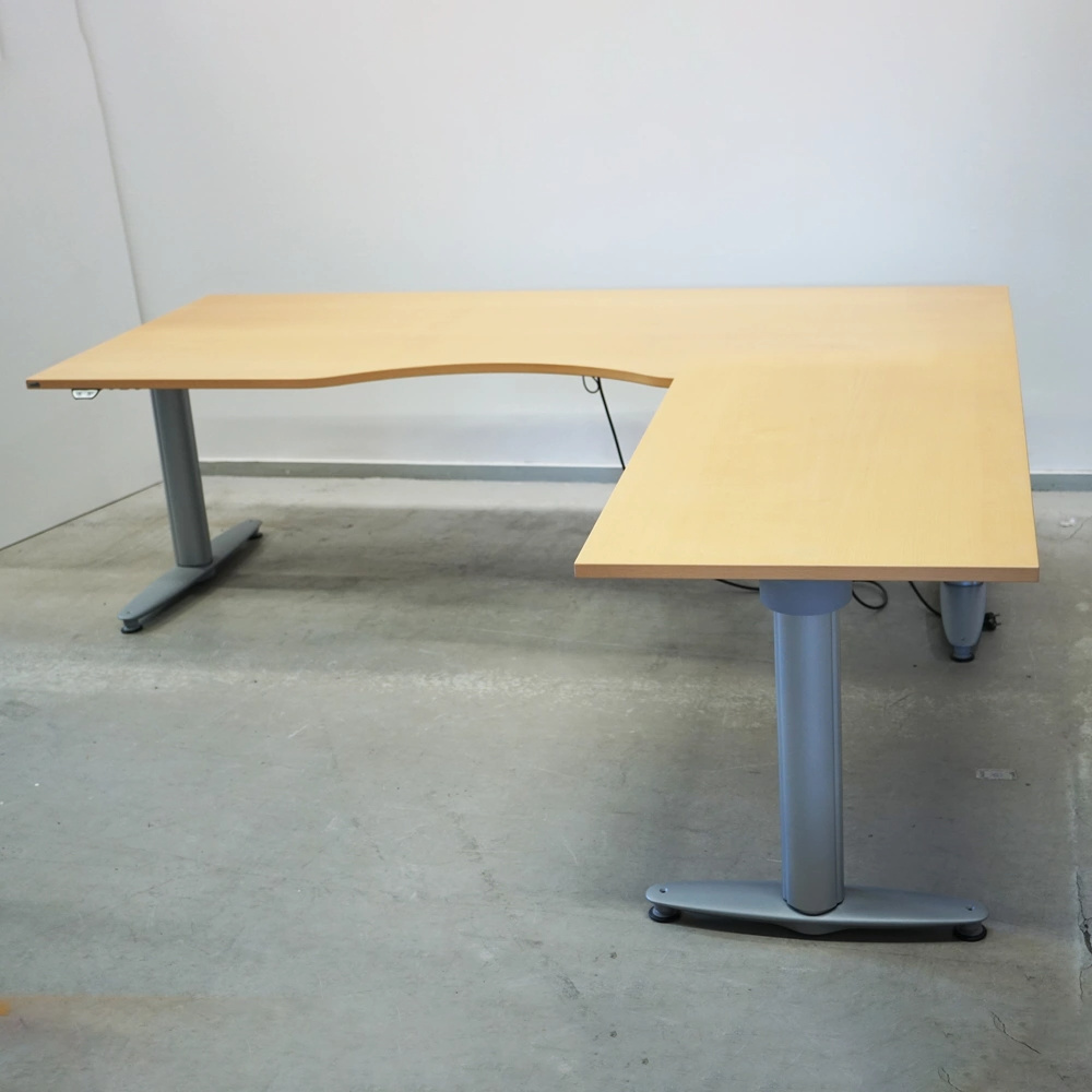 Begagnat höj- och sänkbart skrivbord med påbyggnadsdel höger